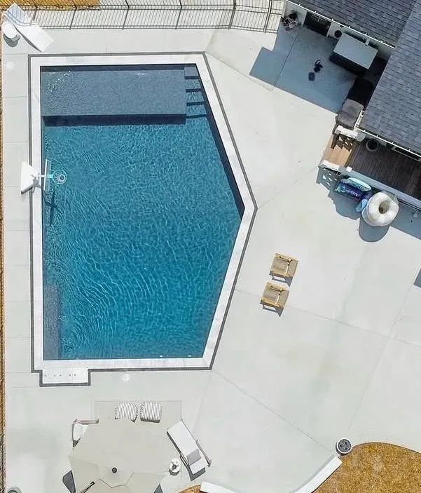 Fuquay-Varina Inground Pool, Black Slate Membrane with Ice White Coping and Brushed Concrete Patio
