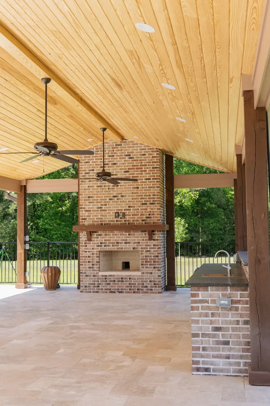 Willow Springs Brick Fireplace and Outdoor Kitchen with Ivory Travertine and Pavilion