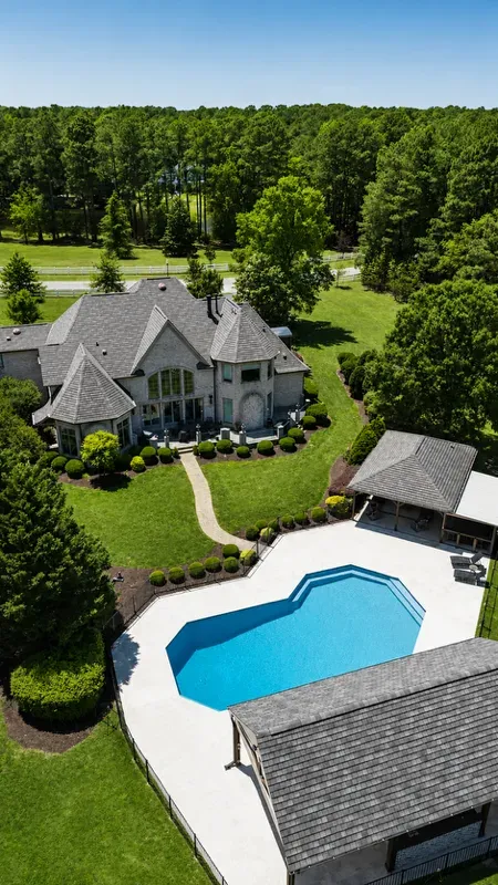Willow Springs Inground Pool, Granite Grey Membrane with Ivory Travertine and Two Poolside Pavilions