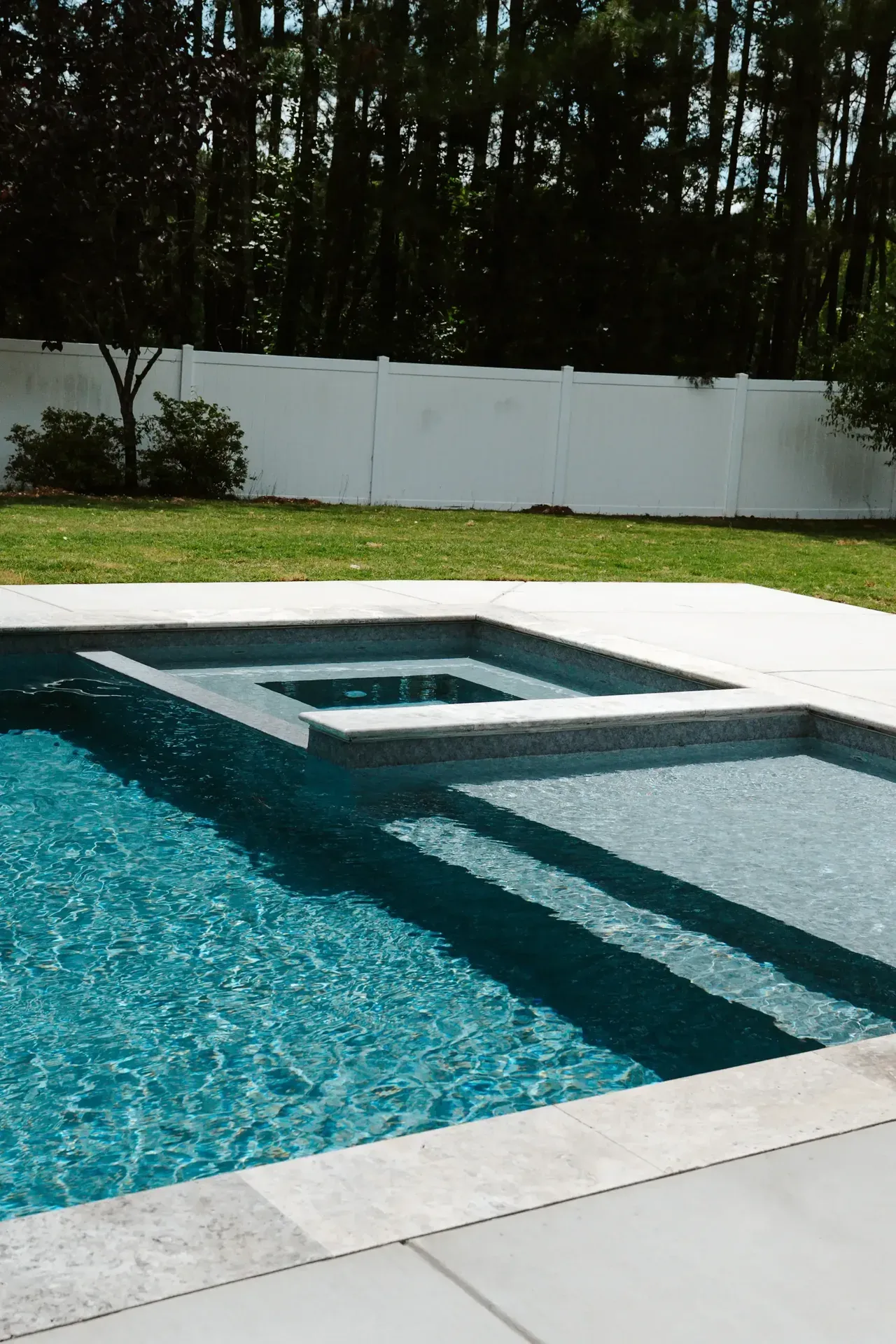 Backyard swimming pool built by NOAT Outdoor Living