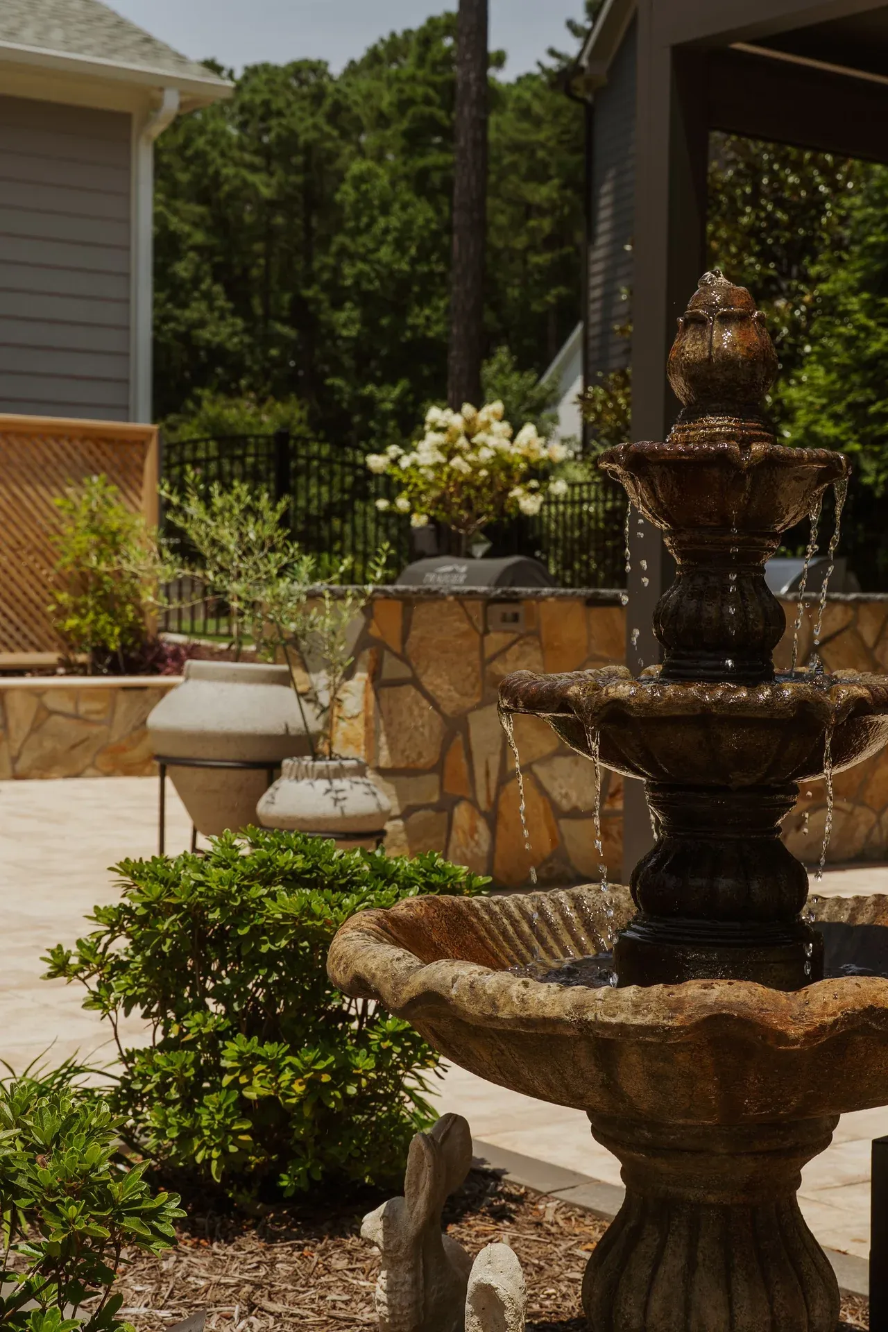 Custom pool at dusk by NOAT Outdoor Living